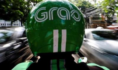 Grab Klaim Biaya Layanan Sesuai Aturan!