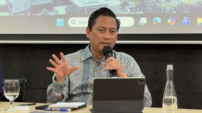 Dari Wamenkeu ke BI: Mampukah Thomas Jaga Independensi? 1 Dari Wamenkeu ke BI: Mampukah Thomas Jaga Independensi?